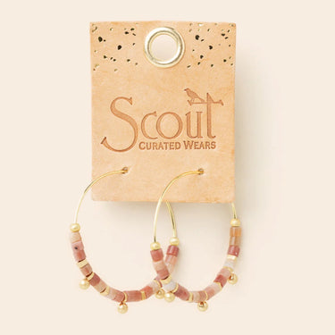 Beaded hoop earrings on a Scout Curated Wears card against a beige background