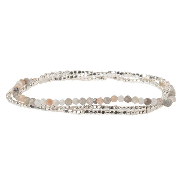 Set of three beaded bracelets on a white background