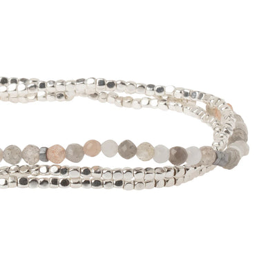 Set of beaded bracelets on a white background