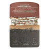 Set of beaded bracelets on a branded card with text about agalmatolite stone.