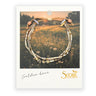 a semi-precious stone bracelet on cute designed cardstock