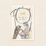 Scout bracelet packaging with two bracelets on a beige background