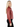 A woman wearing a soft red leather jacket and black pants on a white background