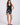Floral print black shorts on a model