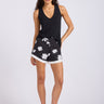 Floral print black shorts on a model