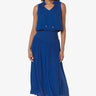 Woman wearing a blue sleeveless top and skirt set on a white background