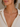 a woman wearing a cz pendant necklce with a gold chain 