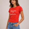 Red baby tee with vacation and meditation written across the front with blue jeans