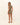 Woman wearing a leopard print swim cover up on a white background