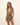 Woman wearing a leopard print swim cover up  on a white background