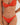 A woman wearing a red orange bikini bottom