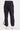 A woman wearing black cargo pants with a cinched detailing on the side of the leg panel.