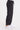 A woman wearing black cargo pants with a cinched detailing on the side of the leg panel.