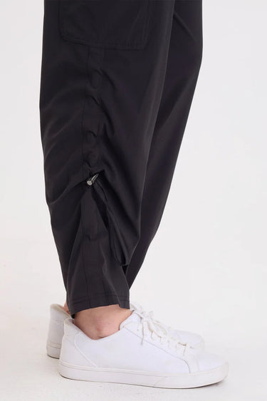  A close up on the cinch side panel of the active cargo pants.