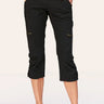 Black capri pants worn by a person on a white background