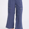 A close up of the blue twill cargo pants on a white background 