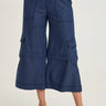 Navy blue cargo pants worn by a person on a white background