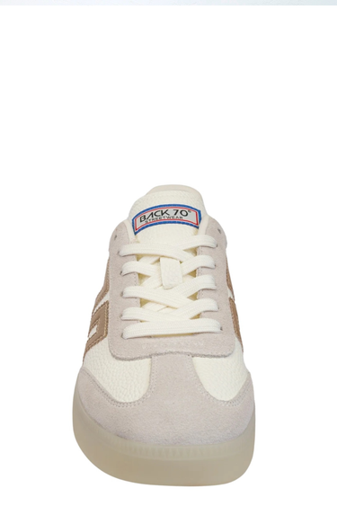 White sneaker with a visible brand logo on a white background