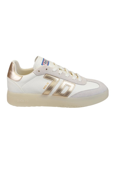 White sneaker with gold accents on a white background