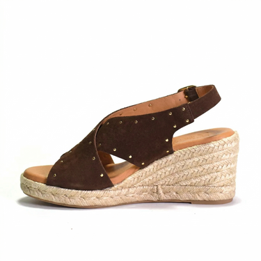 Brown wedge sandal with espadrille sole on a white background