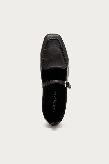 Top view of Kelsi Dagger Ferry Mary Jane flat in black leather showing square toe, stitching and buckle strap
