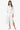 woman wearing the white Eyelet Trim Long White Shirt Dress standing with a white background
