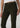 Close-up of Joe’s Jeans Inez Corduroy Pant in Olive showing fine-wale corduroy, waistband and front pockets