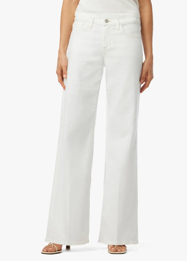 White wide-leg pants worn by a person on a white background