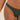 Close-up of a woman's hip wearing a dark forest green textured crinkle high-cut bikini bottom, highlighting the fabric's unique texture and the garment's cut.